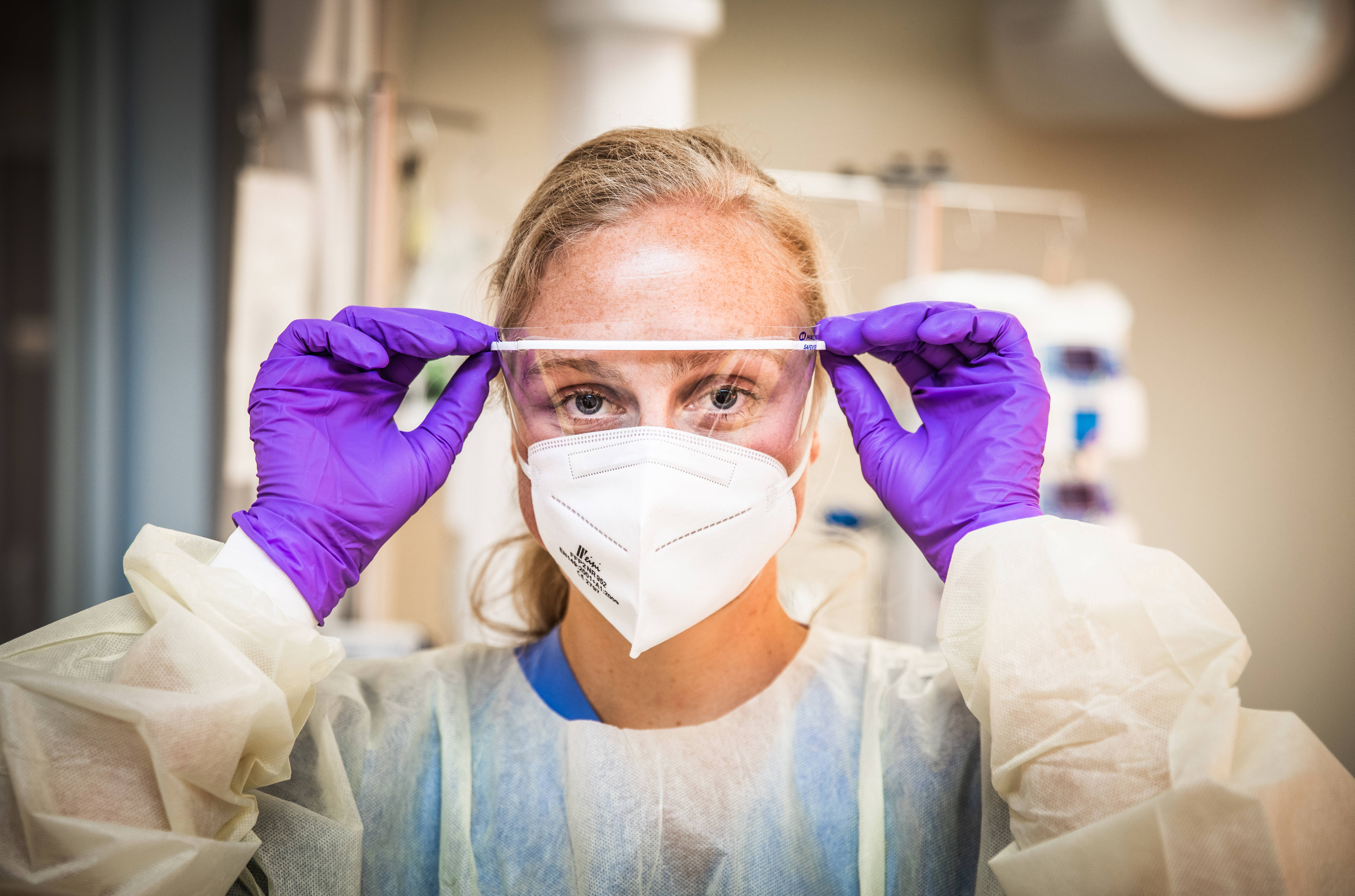 Intensive Care verpleegkundige met beschermingsmiddelen voor coronavirus (Jeffrey Groeneweg, ANP)